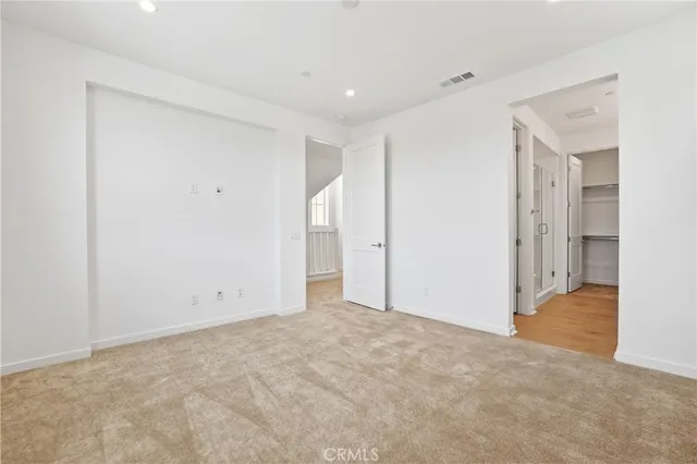 a bathroom with a granite countertop sink a shower and a mirror