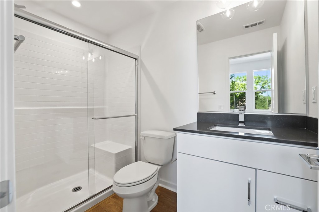139 Jessup Way Tustin, CA 92780 - Photo 26 of 31 a bathroom with a sink toilet and shower