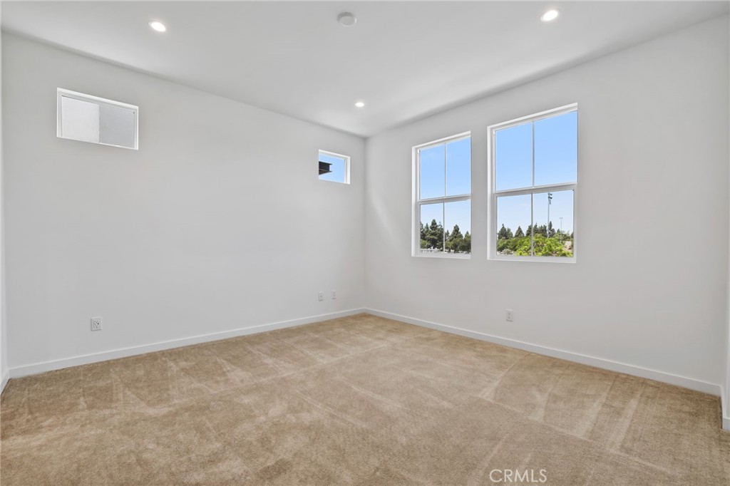 139 Jessup Way Tustin, CA 92780 - Photo 27 of 31 an empty room with a window