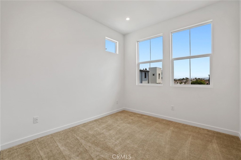 139 Jessup Way Tustin, CA 92780 - Photo 29 of 31 a view of an empty room with a window