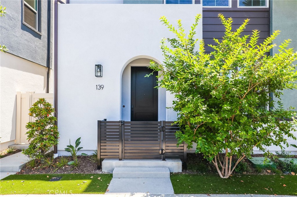 139 Jessup Way Tustin, CA 92780 - Photo 6 of 31 a front view of a house with garden