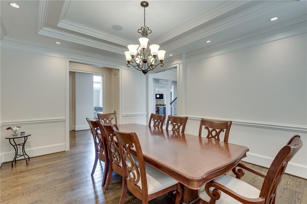 187 Fontaine Road Southwest Mableton, GA 30126 - Photo 14 of 84 a view of a dining room with furniture and wooden floor