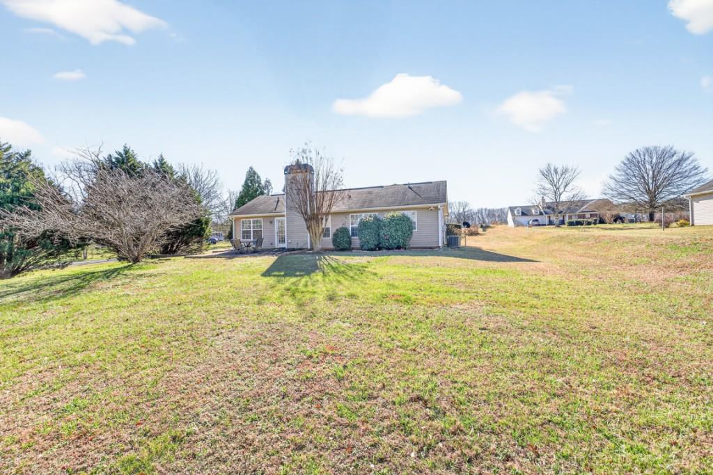 1501 Cardinal Lane Winder, GA 30680 - Photo 31 of 33 a view of an ocean and beach