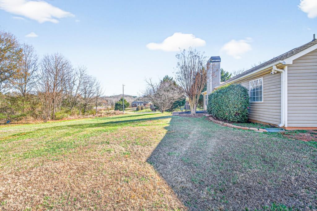 1501 Cardinal Lane Winder, GA 30680 - Photo 32 of 33 a view of a playground with basketball court