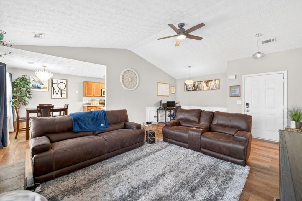 1501 Cardinal Lane Winder, GA 30680 - Photo 5 of 33 a living room with furniture and a large window
