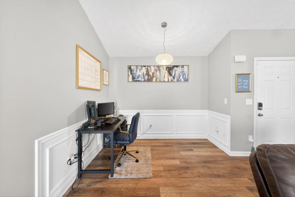 1501 Cardinal Lane Winder, GA 30680 - Photo 9 of 33 a view of a workspace with furniture and a window