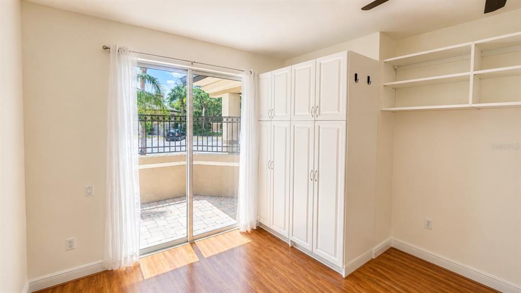 6552 Moorings Point Circle, Unit 102 Lakewood Ranch, FL 34202 - Photo 29 of 57 a view of front door with wooden floor