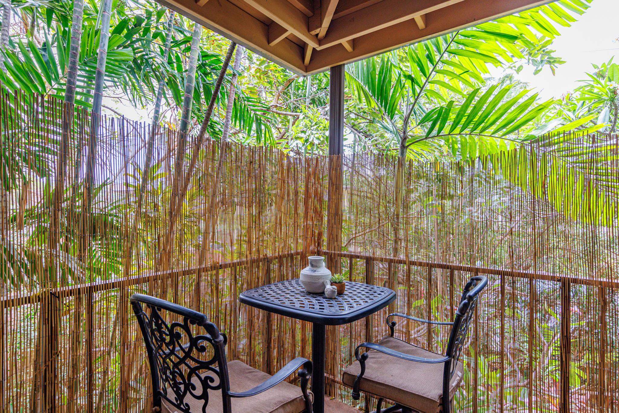 3559 Lower Honoapiilani Road, Unit 720 Lahaina, HI 96761 - Photo 17 of 31 a balcony with table and chairs