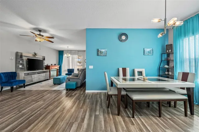 a view of a livingroom with furniture and a flat screen tv