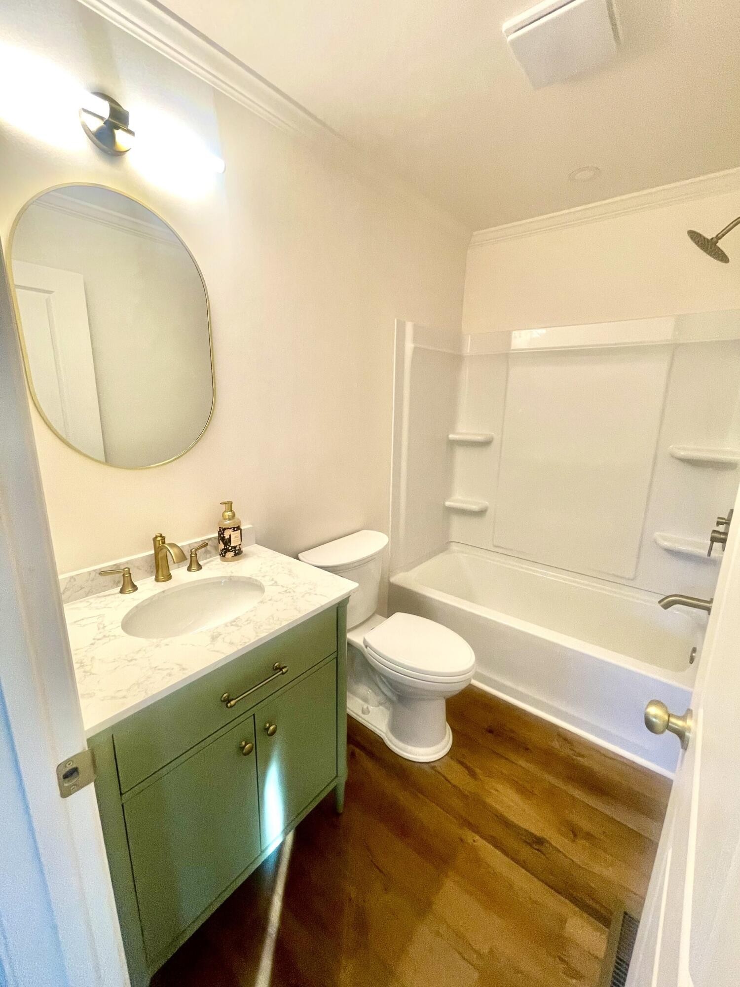 721 South Jackson Street Athens, TN 37303 - Photo 11 of 17 a bathroom with a sink and a mirror