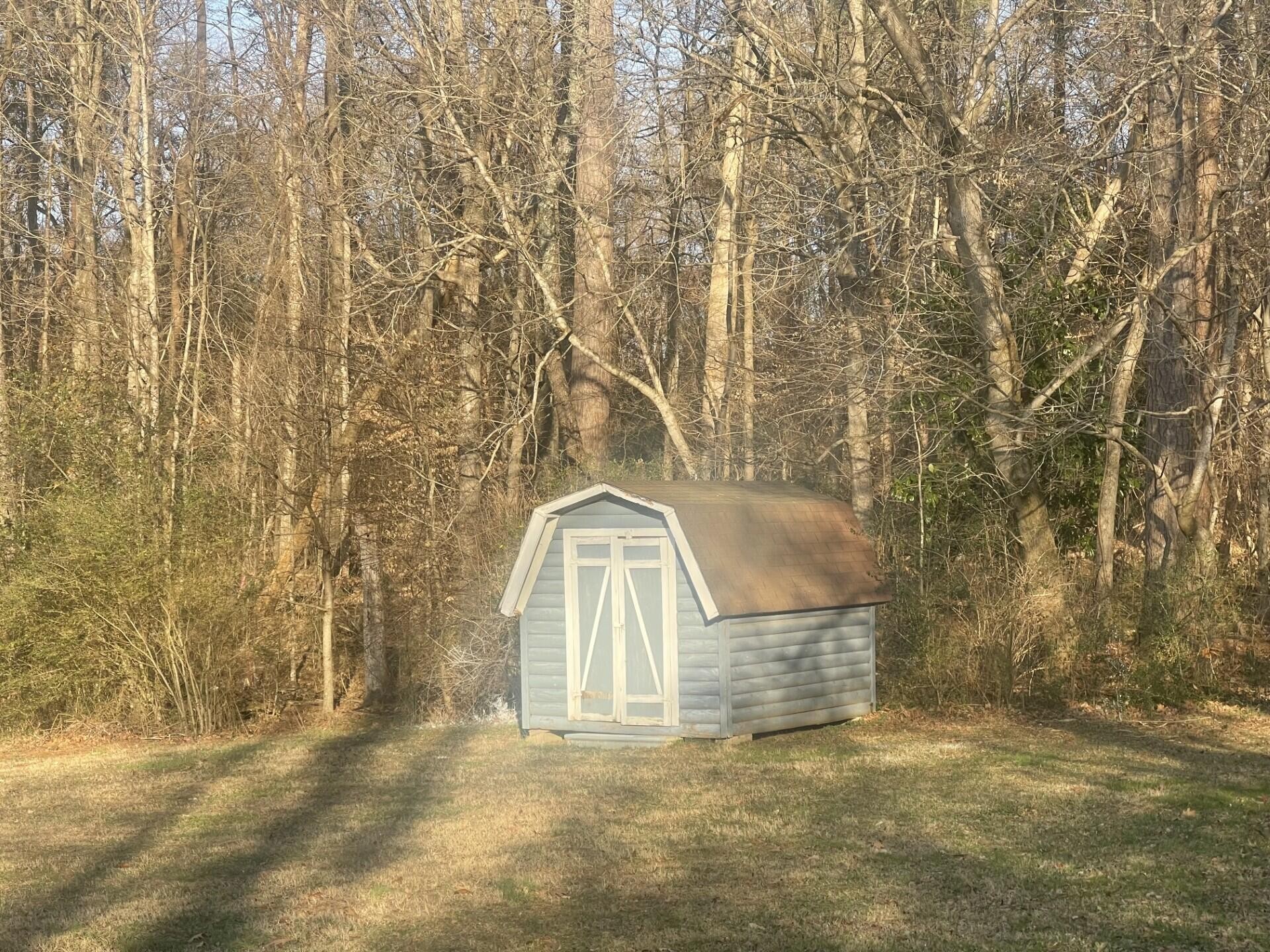 721 South Jackson Street Athens, TN 37303 - Photo 3 of 17 a view of a yard with an outdoor space