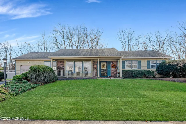 front view of a house and a yard
