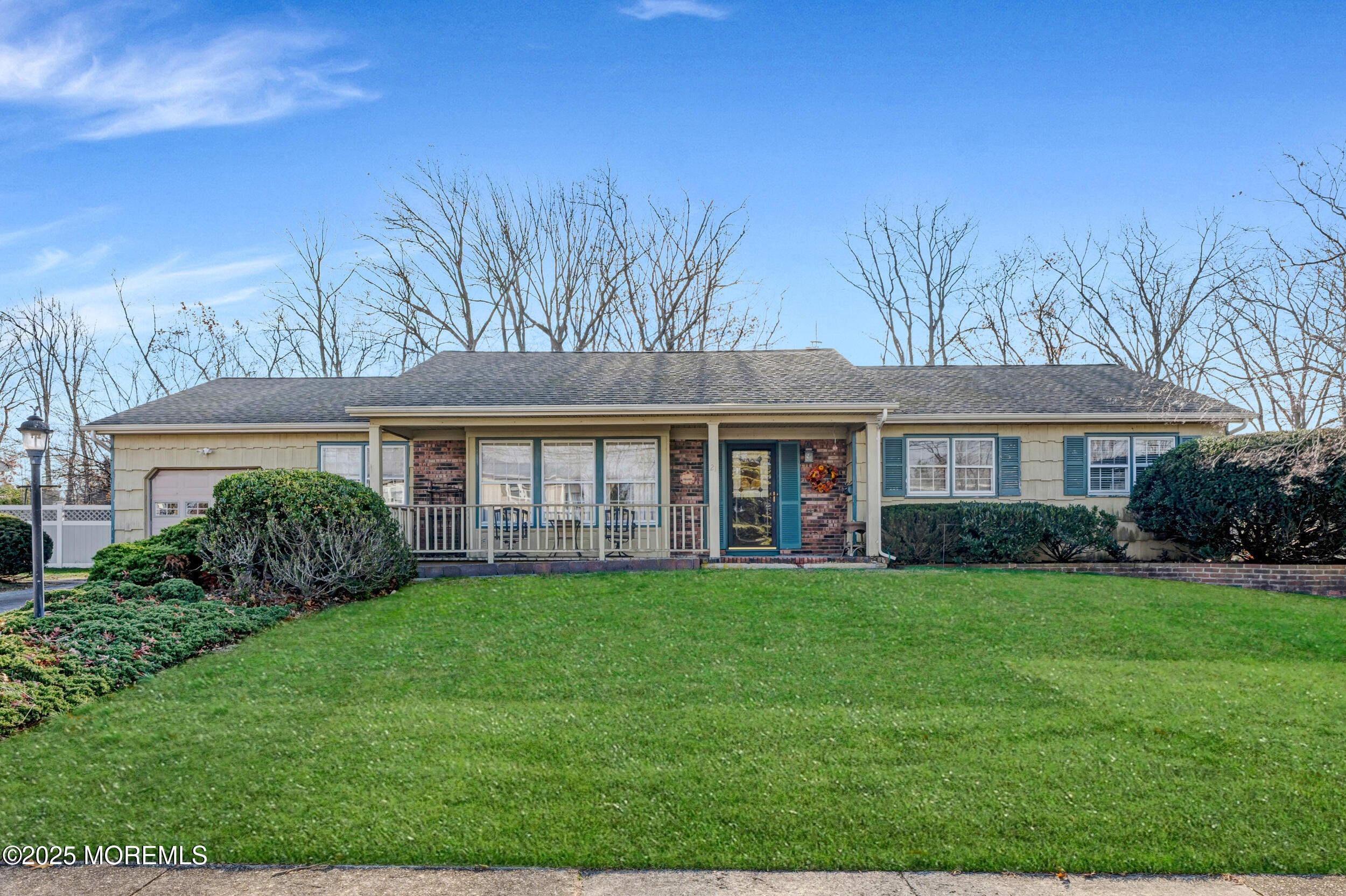 front view of a house and a yard
