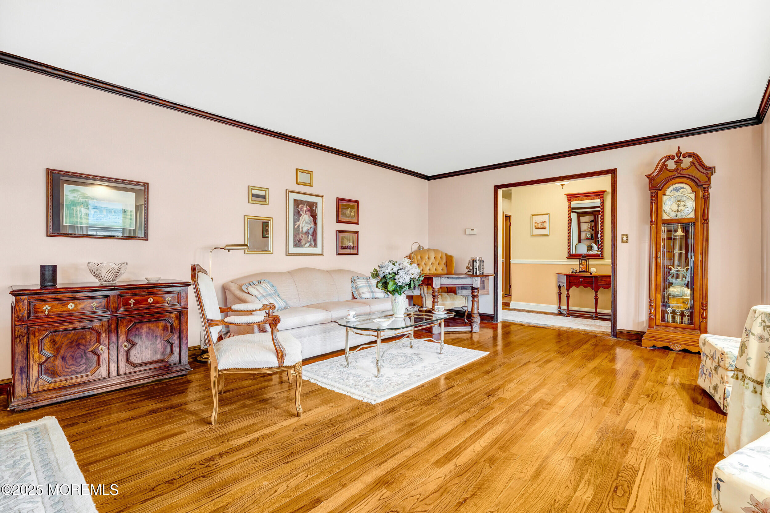 21 Meadowbrook Drive Howell, NJ 07731 - Photo 12 of 52 a living room with furniture and wooden floor