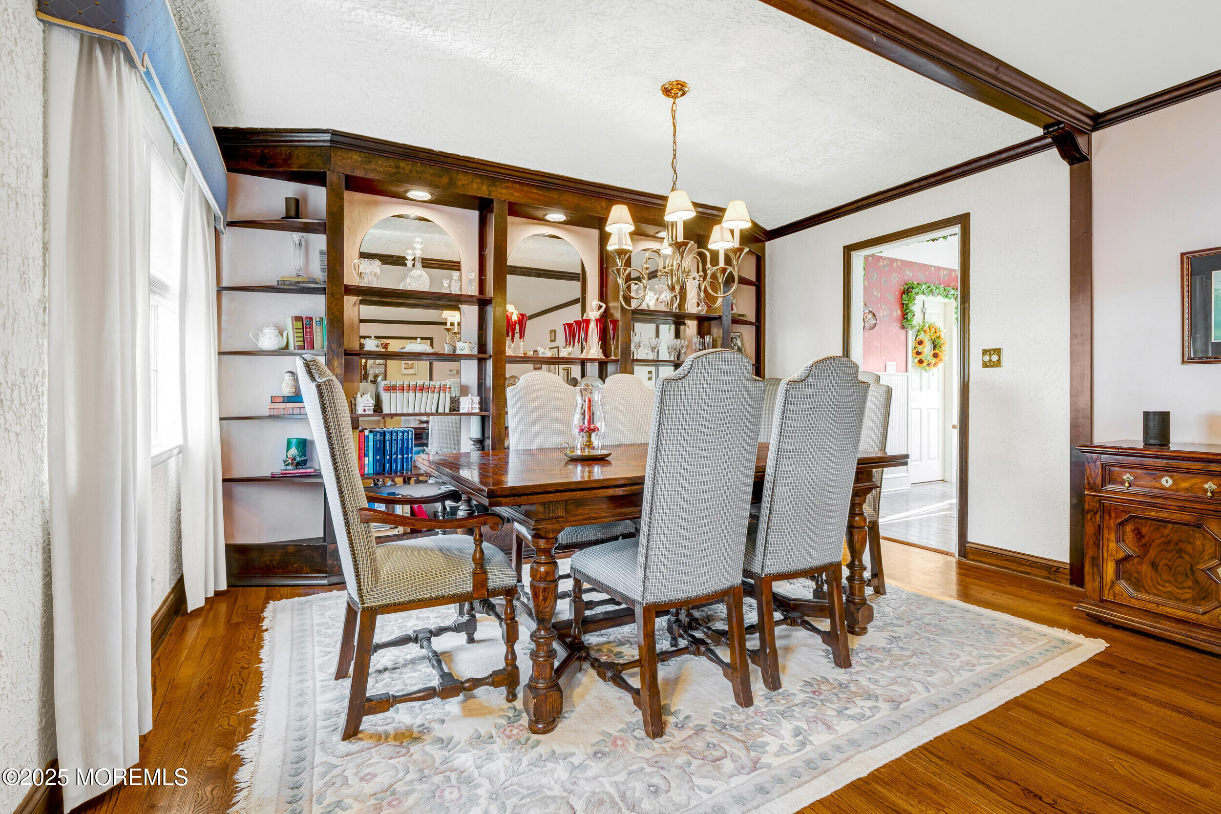 21 Meadowbrook Drive Howell, NJ 07731 - Photo 14 of 52 a view of a dining room with furniture window and wooden floor