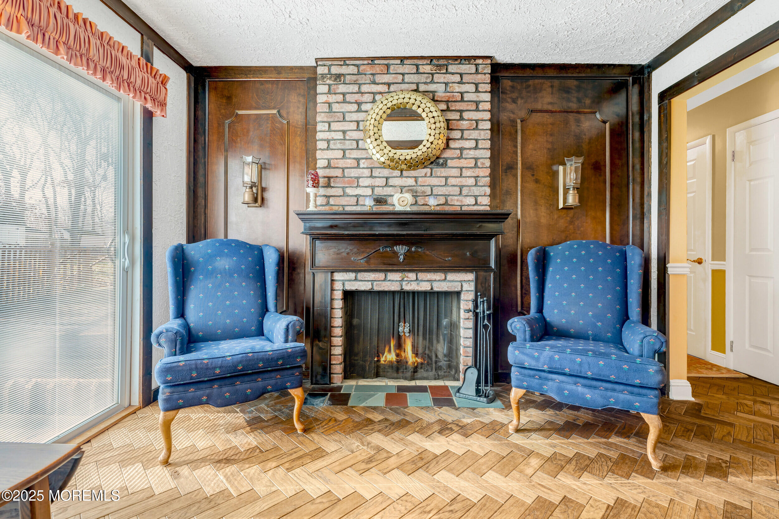 21 Meadowbrook Drive Howell, NJ 07731 - Photo 29 of 52 a living room with furniture and a fireplace