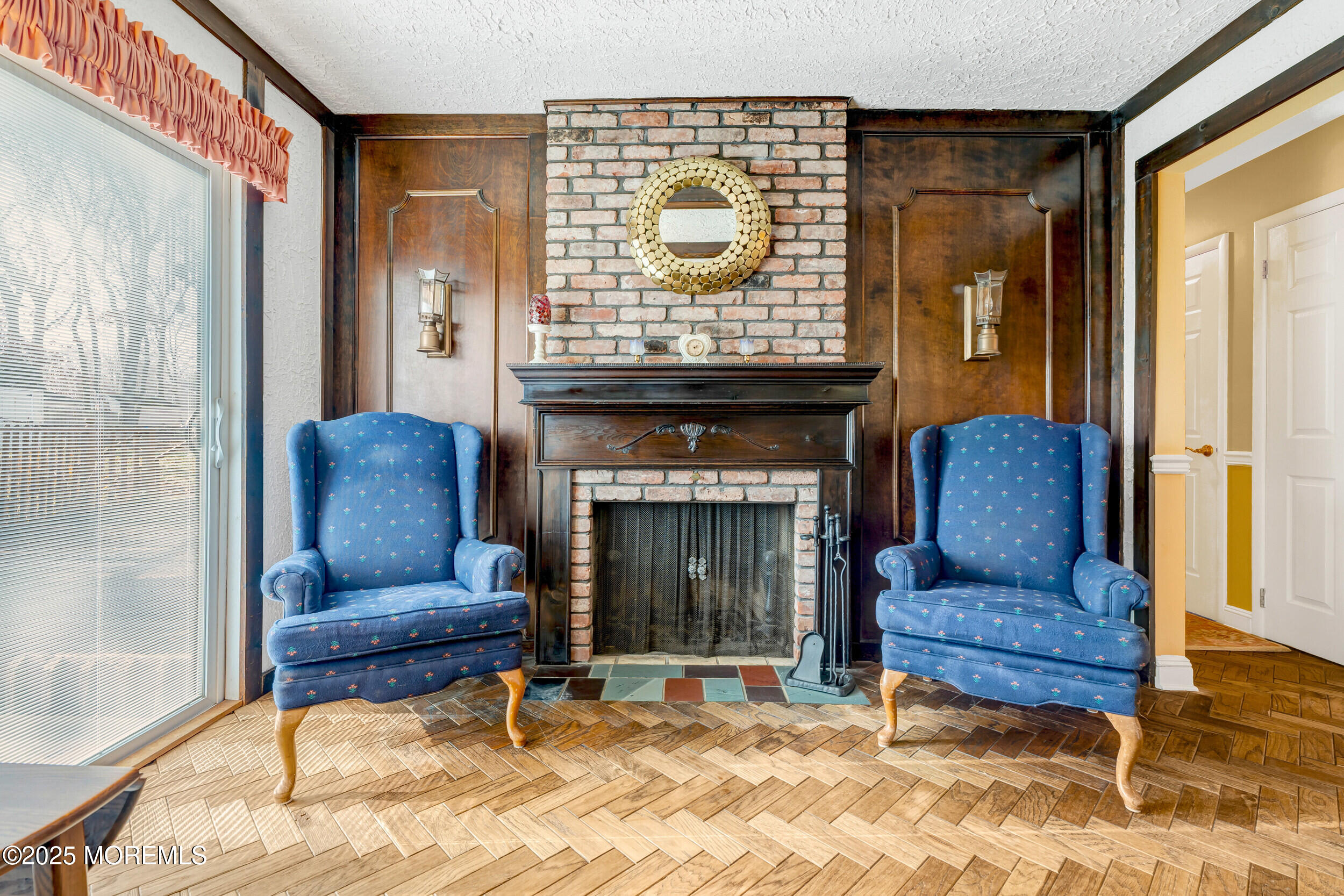 21 Meadowbrook Drive Howell, NJ 07731 - Photo 30 of 52 a living room with furniture and a fireplace