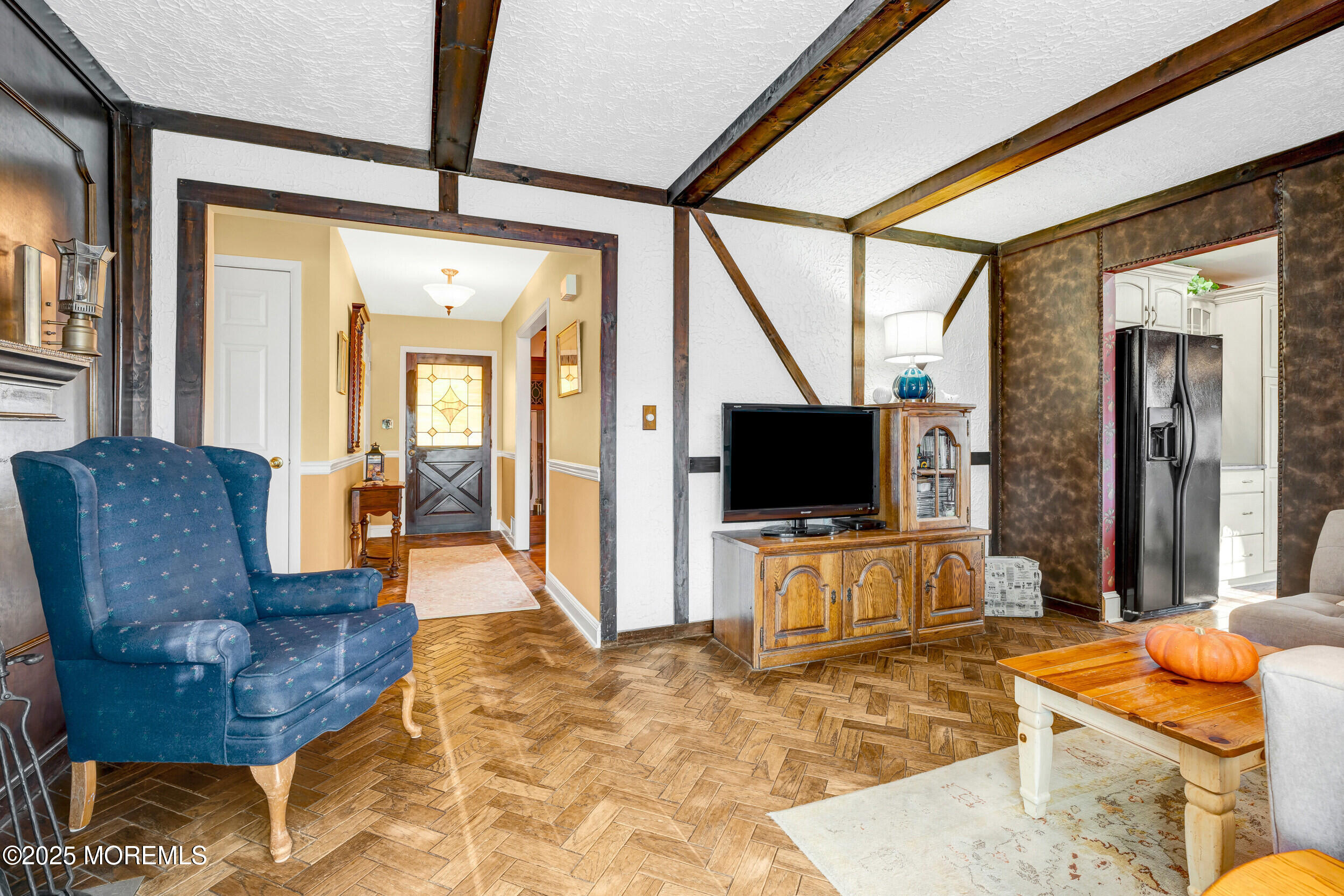 21 Meadowbrook Drive Howell, NJ 07731 - Photo 33 of 52 a living room with furniture and a flat screen tv
