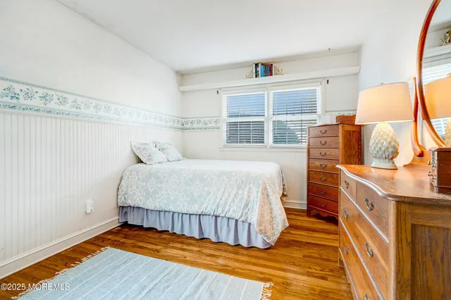 a view of living room filled with furniture and white walls
