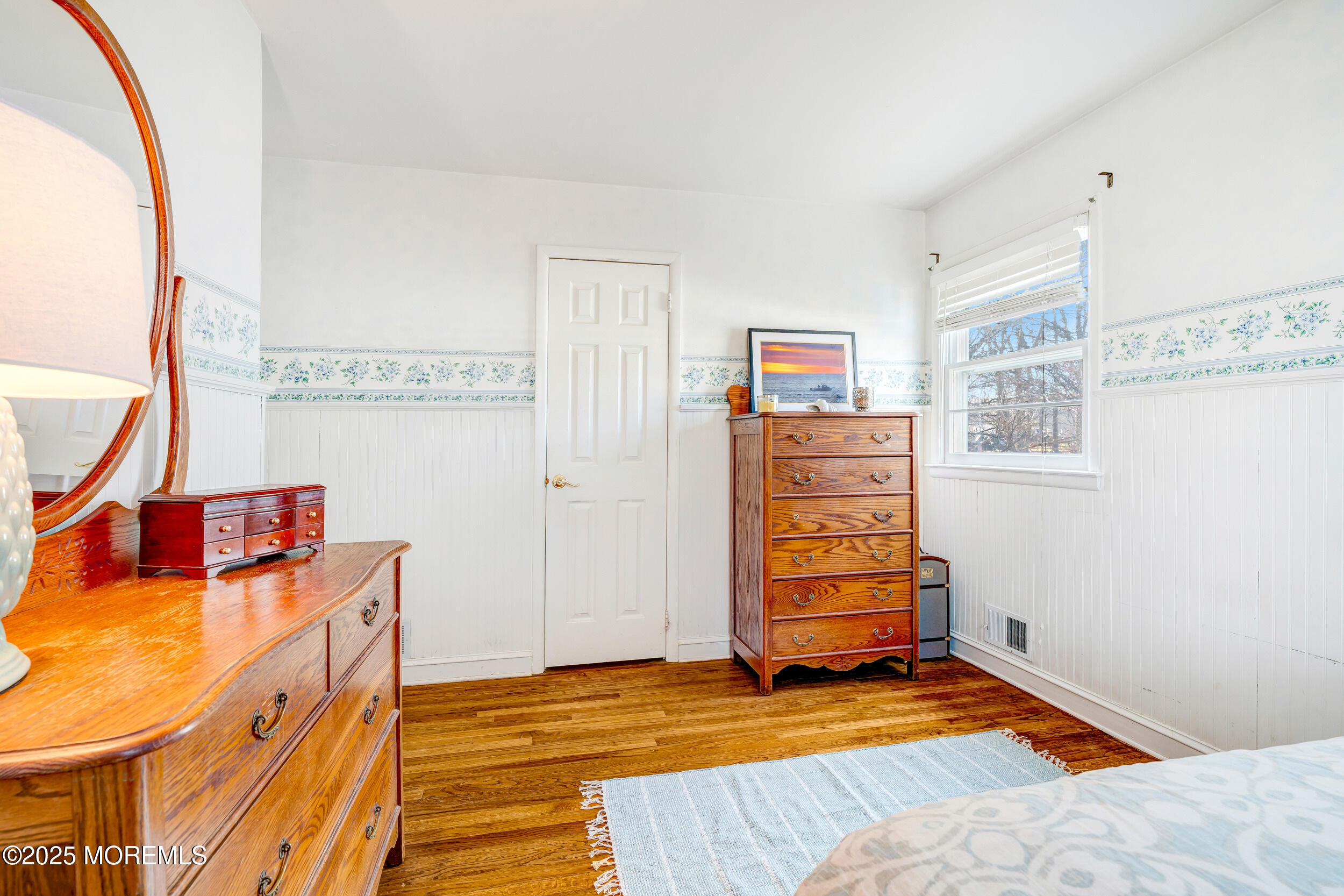 21 Meadowbrook Drive Howell, NJ 07731 - Photo 40 of 52 a view of a bedroom with baby crib and cabinet