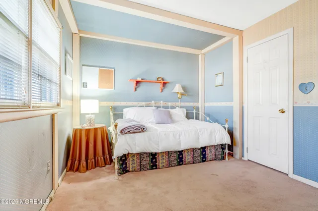 a view of a backyard with large trees