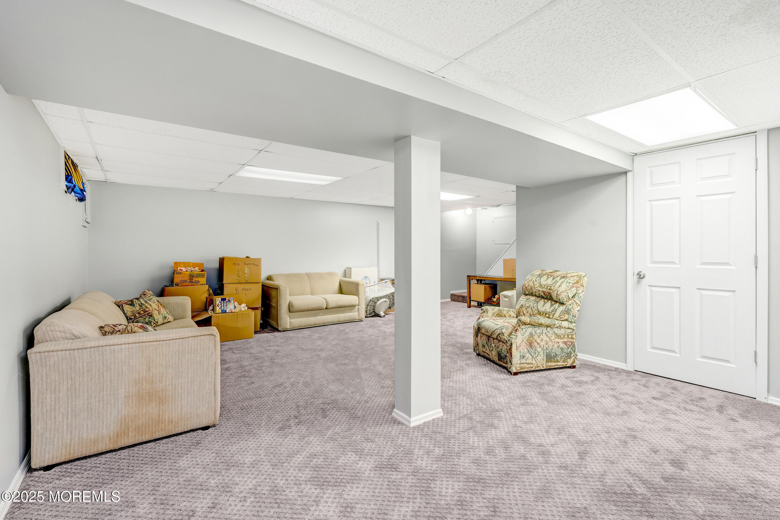 21 Meadowbrook Drive Howell, NJ 07731 - Photo 44 of 52 a view of living room filled with furniture and white walls