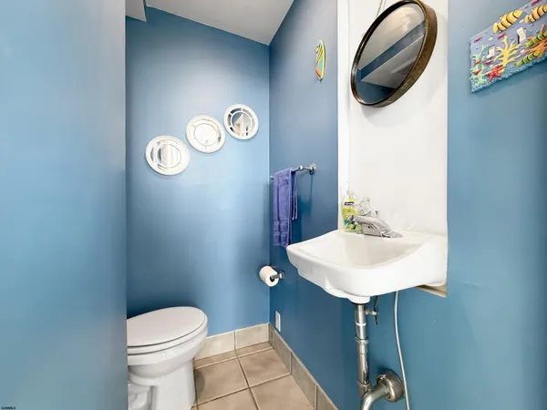 a living room with furniture or couch and a large window