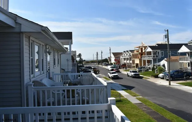 a view of sitting area in front of house