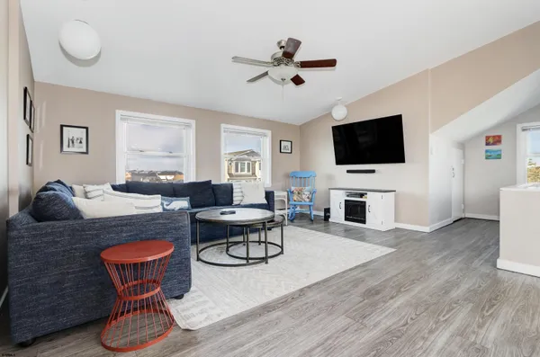 a bedroom with a bed and a table