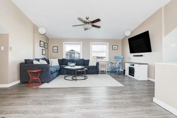 a kitchen with granite countertop a sink and stainless steel appliances