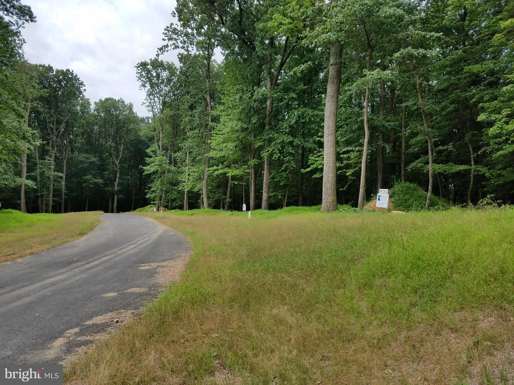 1608 Florence Road Mount Airy, MD 21771 - Photo 5 of 8 a view of a field with trees in the background