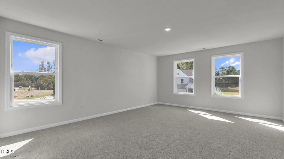 128 Gilmer Street Fuquay-Varina, NC 27526 - Photo 16 of 42 a view of a window in a room