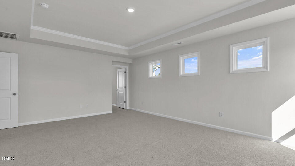 128 Gilmer Street Fuquay-Varina, NC 27526 - Photo 19 of 42 a view of an empty room