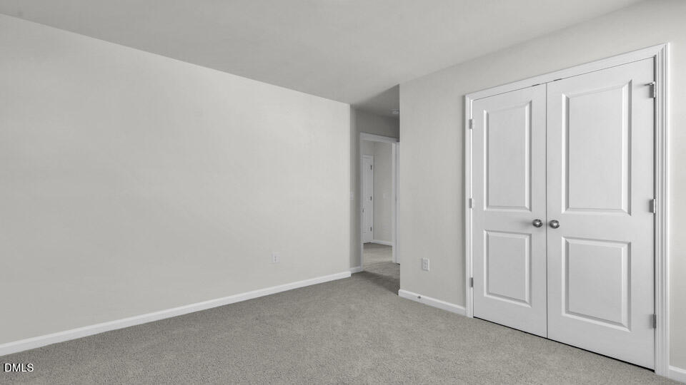 128 Gilmer Street Fuquay-Varina, NC 27526 - Photo 21 of 42 a view of an empty room