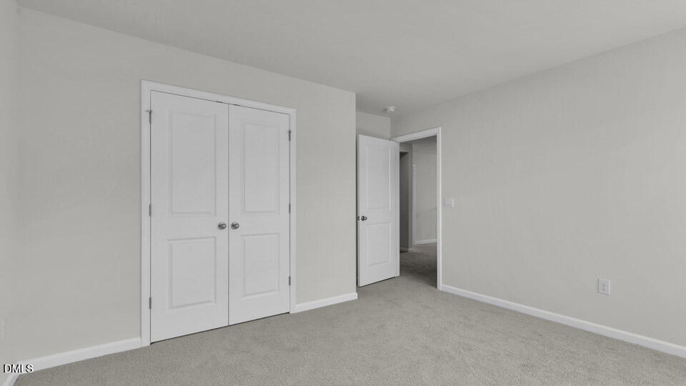 128 Gilmer Street Fuquay-Varina, NC 27526 - Photo 24 of 42 a view of an empty room