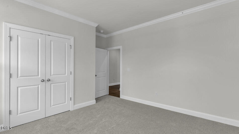 128 Gilmer Street Fuquay-Varina, NC 27526 - Photo 25 of 42 a view of an empty room