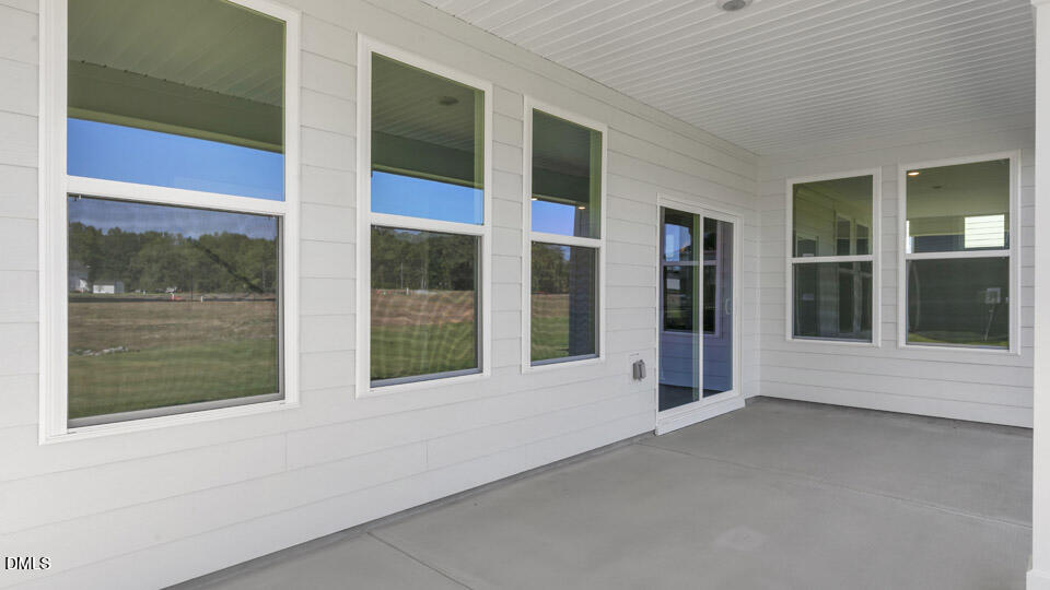 128 Gilmer Street Fuquay-Varina, NC 27526 - Photo 37 of 42 a view of an empty room with a window
