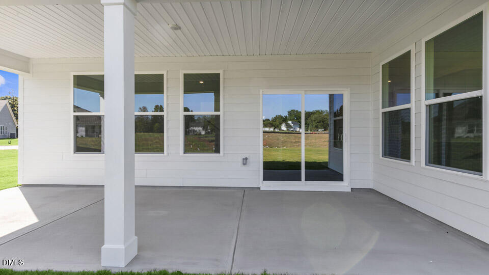 128 Gilmer Street Fuquay-Varina, NC 27526 - Photo 39 of 42 a view of a house with a large window
