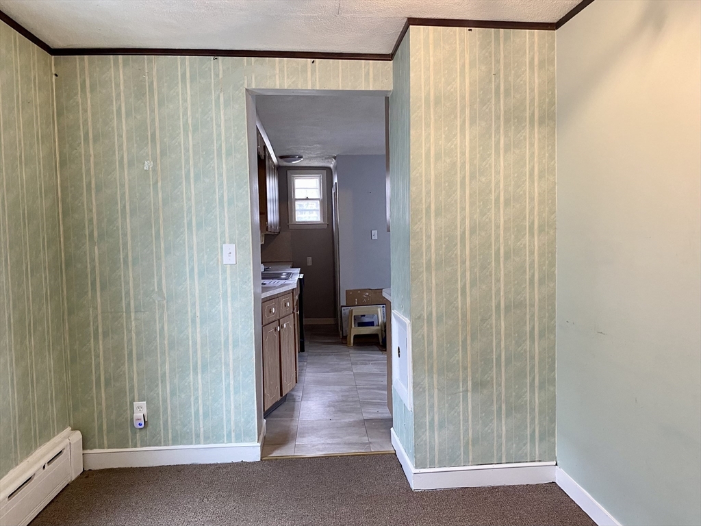 43 Glenwood Avenue, Unit 1 Boston, MA 02136 - Photo 4 of 11 a view of a hallway with closet and entryway