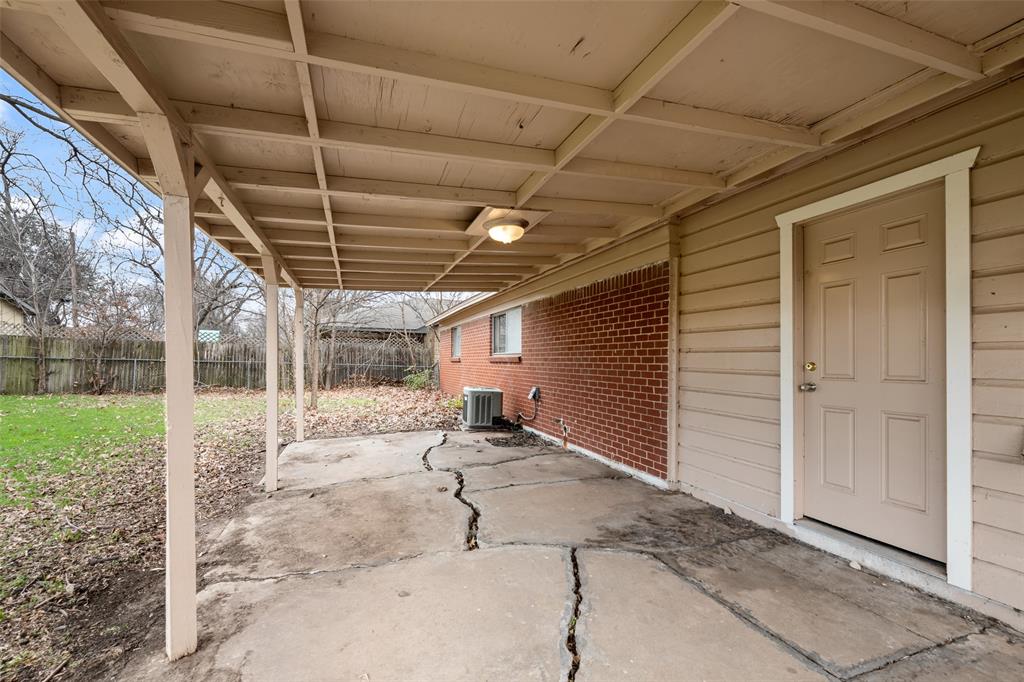 404 Vaden Avenue Everman, TX 76140 - Photo 14 of 16 a view of a garage