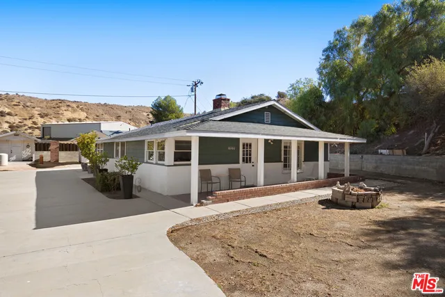 a front view of a house with a porch
