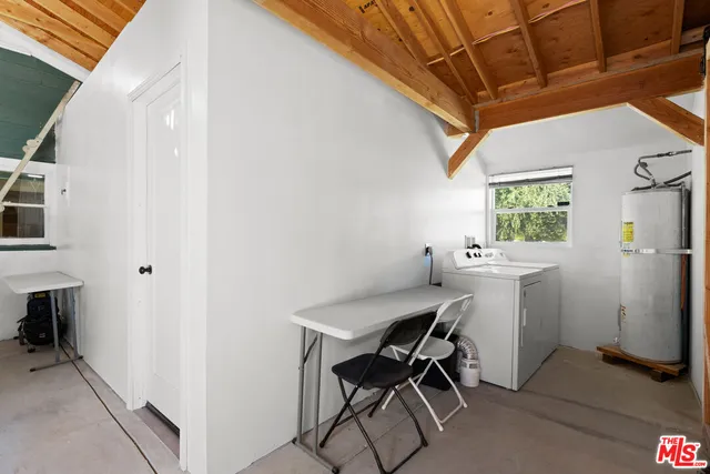 a view of a dining room with furniture and window