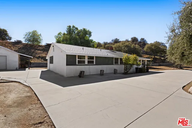 a view of a house with a patio