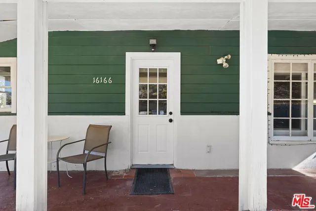 a front view of a house with porch