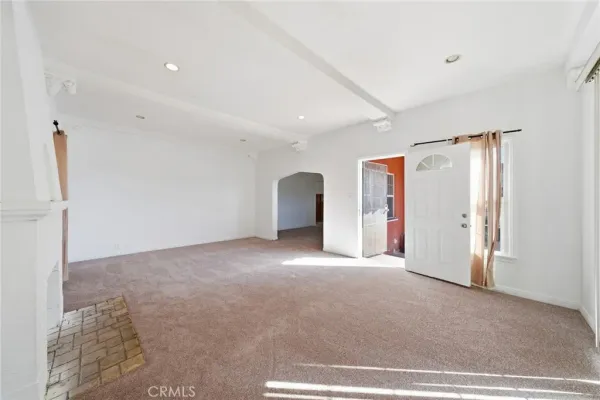 a view of a livingroom with a staircase
