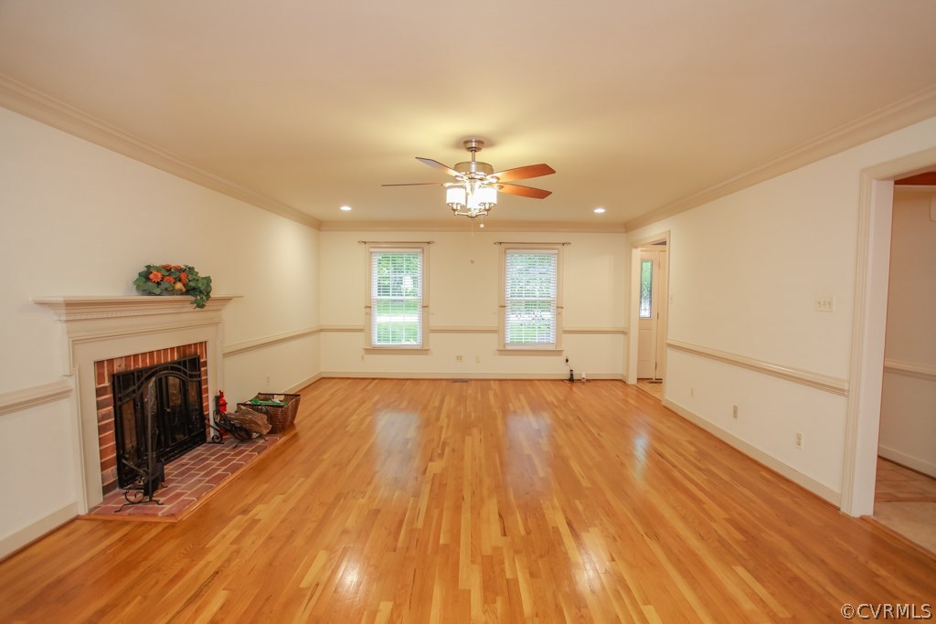 13900 Beechwood Point Road Midlothian, VA 23112 - Photo 10 of 34 a view of an empty room with a fireplace and a window