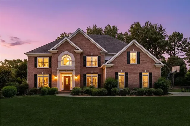 an aerial view of a house with a garden