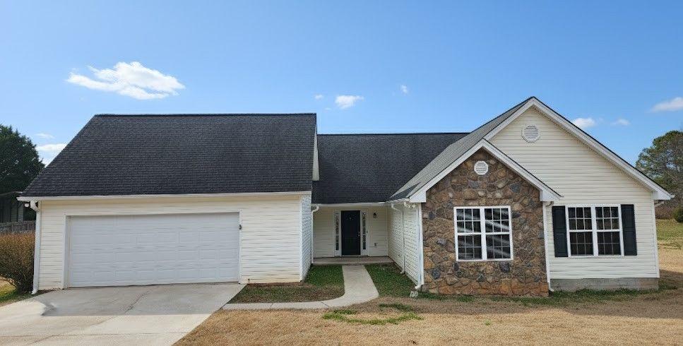 89 Savannah Lane Jefferson, GA 30549 - Photo 1 of 19 a front view of a house