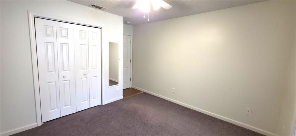 89 Savannah Lane Jefferson, GA 30549 - Photo 14 of 19 an empty room with a empty space and a window