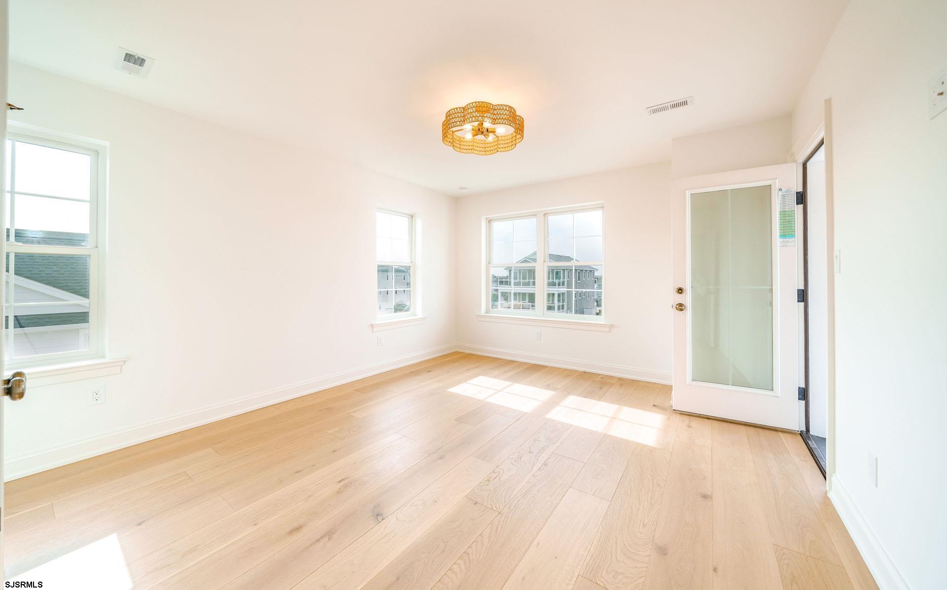5217 Simpson Avenue Ocean City, NJ 08226 - Photo 27 of 52 a view of an empty room and a window